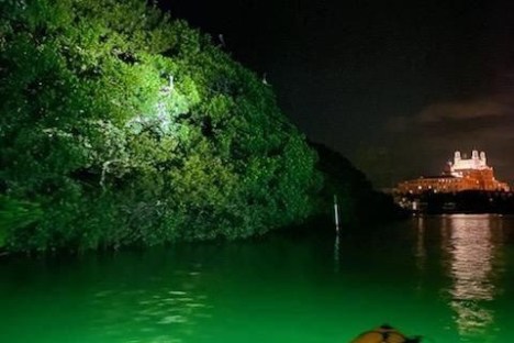 a small boat in a body of water