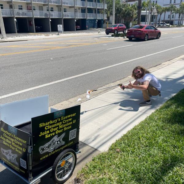 a person sitting on the side of a road
