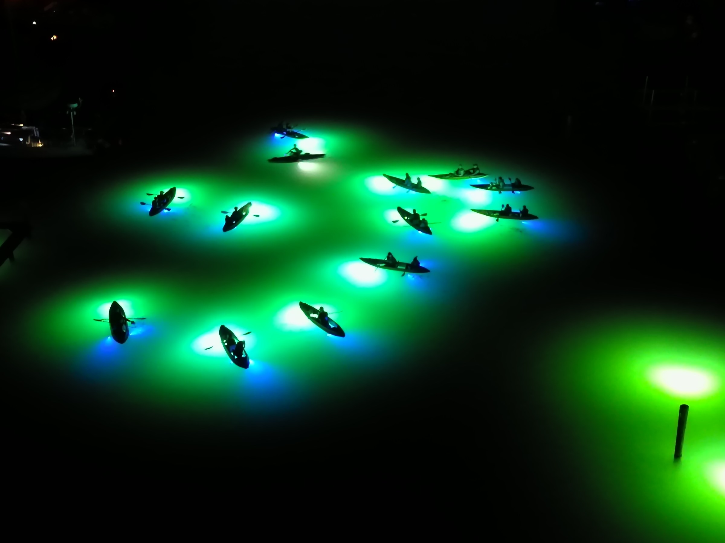 a group of people in a dark room