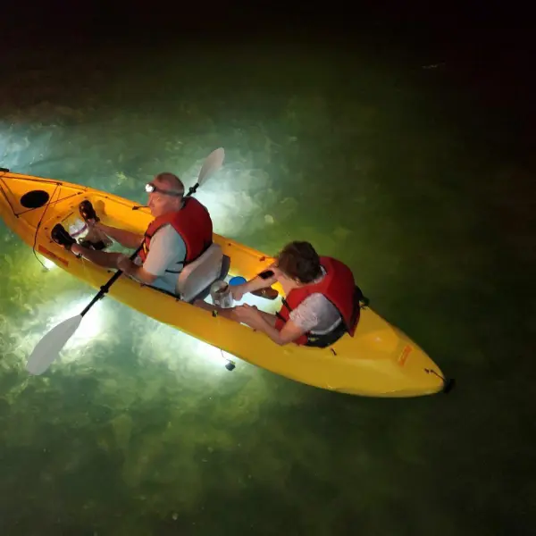 a man riding a wave on a surfboard in the water