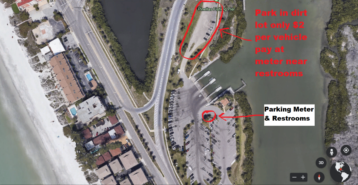 Aerial view showing parking areas near a beach with labeled meter and restroom locations.
